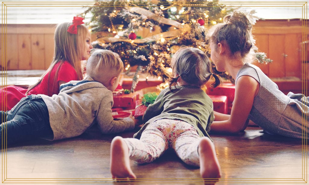 kids under christmas tree