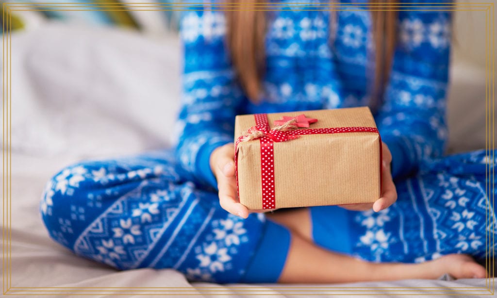 girl holding gift