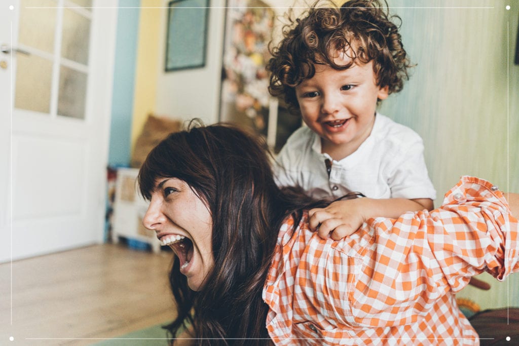 mom and son playing