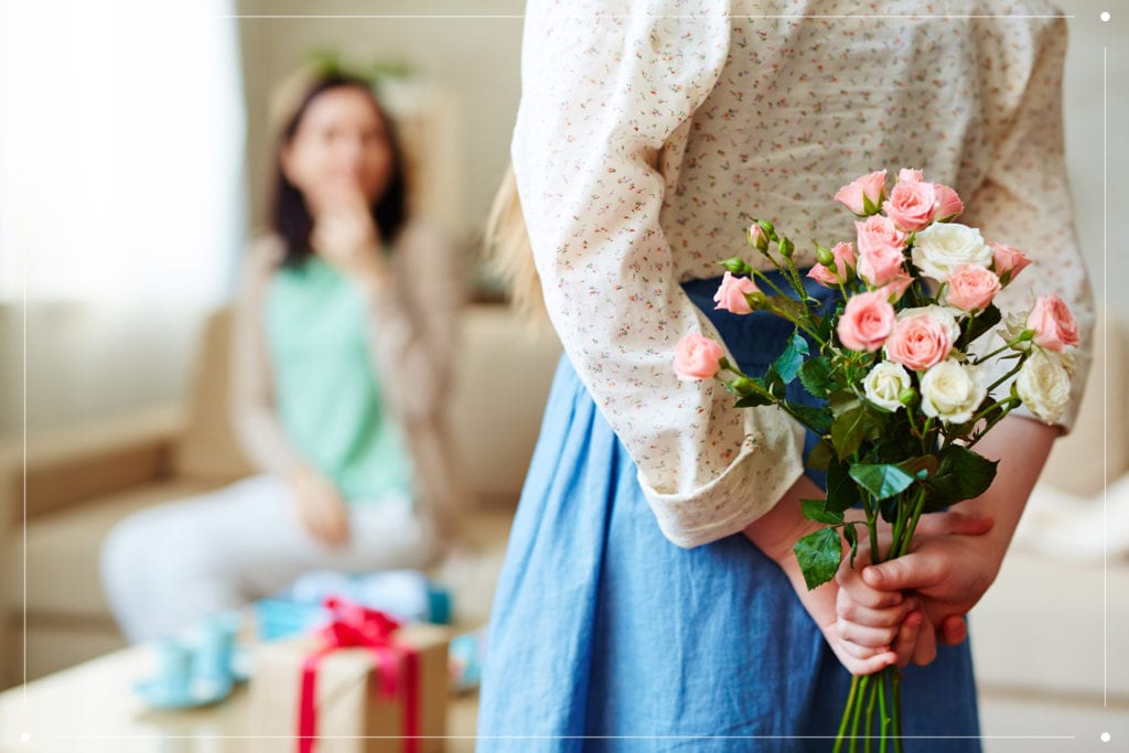 daughter holding flowers